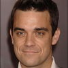 Robbie Williams revine cu balade pe noul album