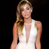Ups! Lui Miley Cyrus i-a iesit (iar!) sanul din bluza! (foto)